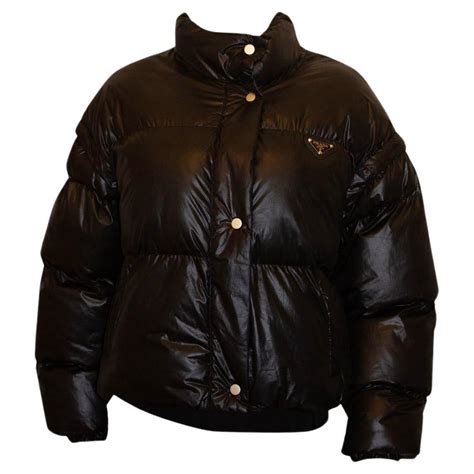 Black Prada Puffa Jacket with Detachable Sleaves .